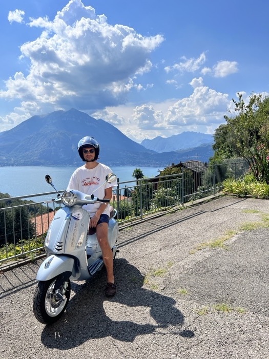 Austin on a Vespa above Lake Como